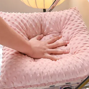 Close-up of pink thickened doudou velvet seat cushion with soft dotted texture