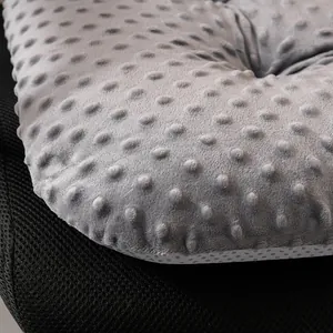 Macro shot of grey bubble fleece fabric texture on a thick thickened seat cushion