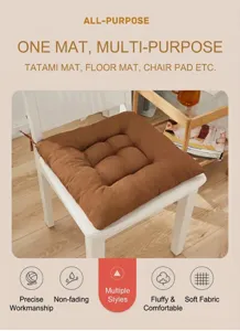 Brown tufted chair cushion on a white chair in a modern minimalist living room setting.