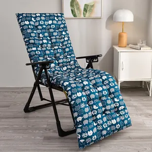 Detailed view of a thick brushed fabric lounge chair cushion featuring cute white cat patterns
