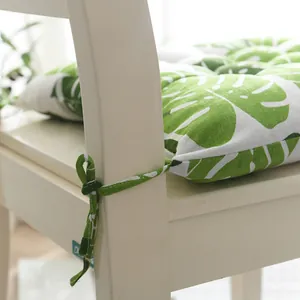 Cómodo cojín de silla de algodón y lino con estampado de hojas de monstera verde