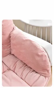 Detailed view of soft pink plush heating seat cushion showing side insulation padding