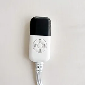 Close-up of the digital controller for the office electric heating seat cushion.