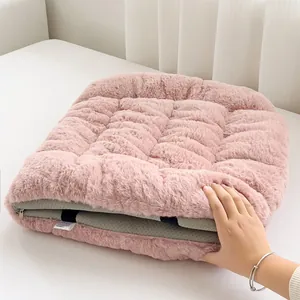 Detail of pink plush electric heated seat cushion showing soft texture and zipper design