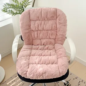 Macro view of soft pink plush heated seat cushion and backrest on a white office chair.