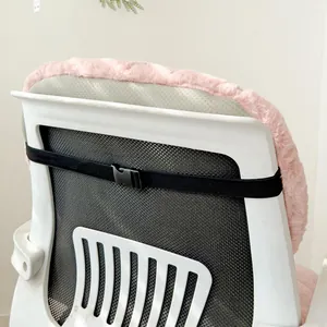 Detail view of black elastic strap and buckle on pink plush office chair cushion