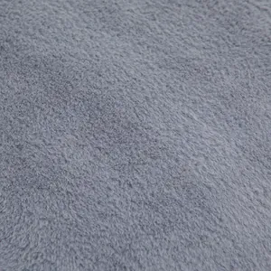 Detailed macro view showing the soft grey plush texture of the winter heated seat cushion