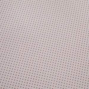 Detailed macro shot of the pink anti-slip silicone dots on a heated seat cushion backing