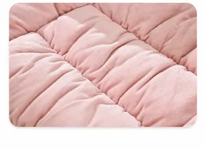 Macro view showing the soft texture of pink baby velvet fabric for a heated seat cushion