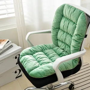 Close-up of integrated electric heated seat cushion on white office chair in green