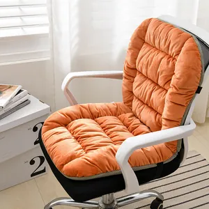 Close-up of plush orange heated seat cushion integrated with backrest on office chair