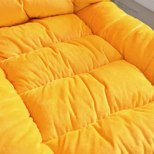 Close-up macro view of plush yellow fabric on a heated integrated chair seat cushion