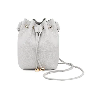 Elegant minimalist light grey lychee grain leather drawstring bucket bag for women