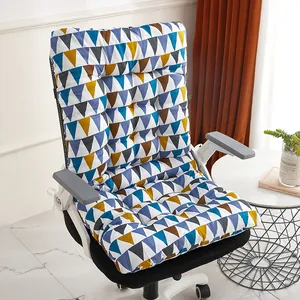 Detail view of a thick one-piece chair cushion with colorful triangle pattern on a chair