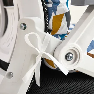 Detailed close-up of a one-piece chair cushion with geometric pattern and white tie-on ribbon