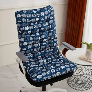 Detail view of a thick navy blue chair cushion with cat patterns on an office chair