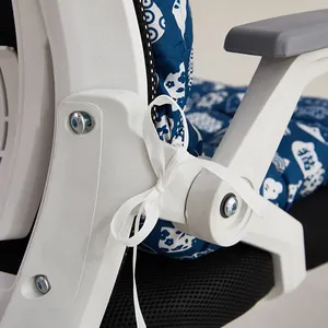 Close-up of integrated blue patterned chair cushion tied to white office chair frame