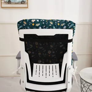 Detailed rear view of thick floral integrated chair cushion showing secure black straps