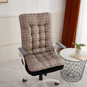 Detail view of a thickened brown grid integrated chair cushion on an office chair