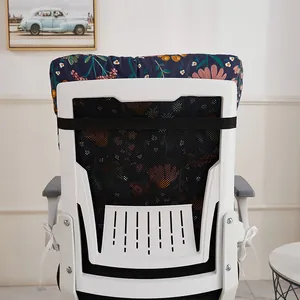 Detailed back view of floral thick cushion pad firmly attached to white office chair
