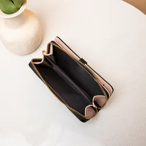 Cartera larga elegante para mujer en negro y rosa con cremallera y múltiples ranuras de tarjeta