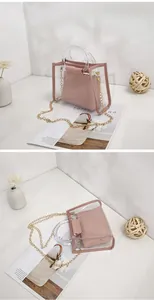 Stylish pink transparent 2-in-1 PVC handbag with gold chain strap and handles