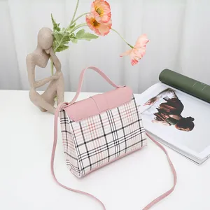 Fashionable pink and white plaid crossbody bag with elegant top handle for women