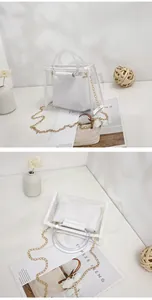Top and side views of stylish white transparent PVC bag-in-bag with a gold chain strap