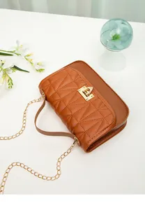 Stylish brown quilted PU leather crossbody bag with elegant gold chain and lock detail