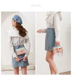 Asian model showcasing a pink transparent quilted handbag in a minimalist interior