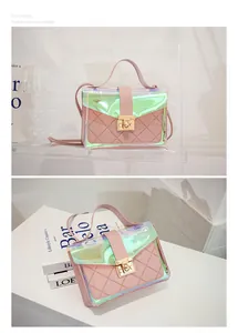 Close-up of stylish pink holographic quilted handbag featuring a gold metal lock clasp
