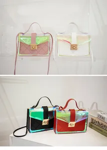 Iridescent transparent lattice handbags in pink, white, black, and red with lock detail