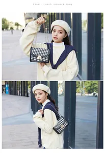 Asian model showcasing a stylish houndstooth small square bag with gold chain strap.