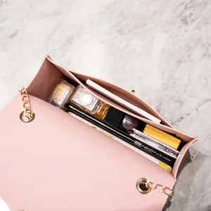 Fashionable pink chain small square bag with spacious interior for daily essentials