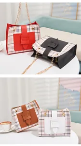 Small plaid square crossbody bags with contrasting colors and gold chain straps