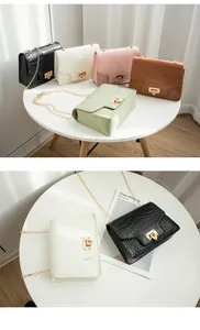 Crocodile pattern crossbody bag with chain strap and lock detail