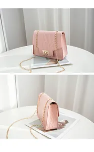 Detailed views of pink crocodile pattern small flap crossbody bag with gold chain strap