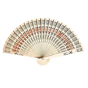 Traditional 8-inch hollow carved wooden folding fan with red floral pattern accents