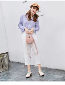 Stylish pink mini backpack for women featuring cute bunny ears and adjustable straps