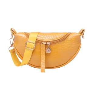Yellow stone pattern crescent crossbody bag with adjustable strap and gold zipper