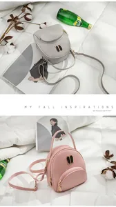 Mini backpack for women featuring cute rabbit ear hardware in pink and grey colors