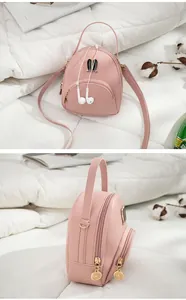 Pink mini faux leather backpack for women featuring cute ear hardware decoration