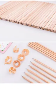 Macro detail of eco-friendly natural wood pencils showing fine grain and sharpened tips