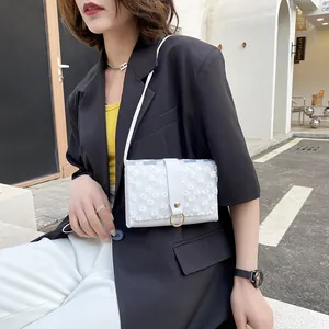 Elegant white floral lace crossbody square bag for women featuring a stylish gold ring closure