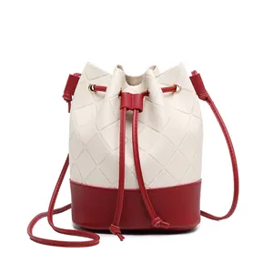 Stylish cream and red quilted drawstring bucket bag for women, crossbody style