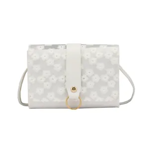 Minimalist white crossbody shoulder phone bag with delicate embroidered floral mesh overlay