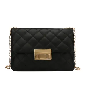 Classic black quilted crossbody bag with gold chain strap and metal lock for women