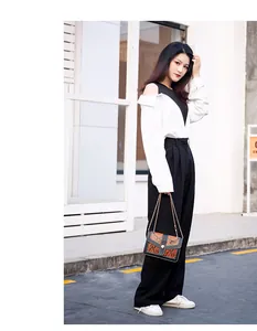 Elegant snake print small crossbody bag for women with gold chain shoulder strap