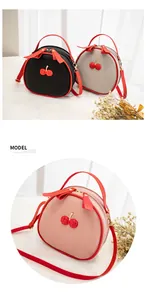 Fashion cherry crossbody bag with red litchi grain texture and contrast trim detail