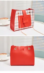 Detailed front and back views of a red plaid women's crossbody bag with chain strap